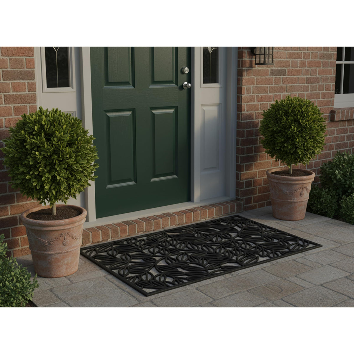 Entryway scene with Calloway Mills Lilac Vine doormat beside the door.