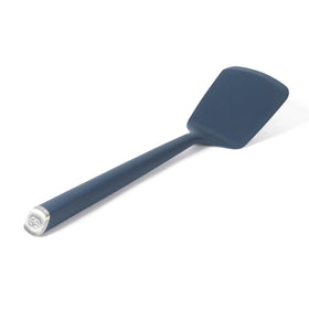 Calphalon Edge silicone turner in navy for gentle flipping on nonstick pans.