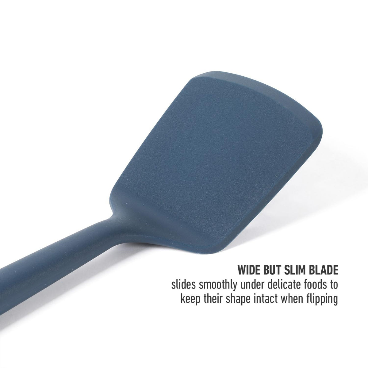 Calphalon Edge turner with non-slip handle offers secure grip during serving.