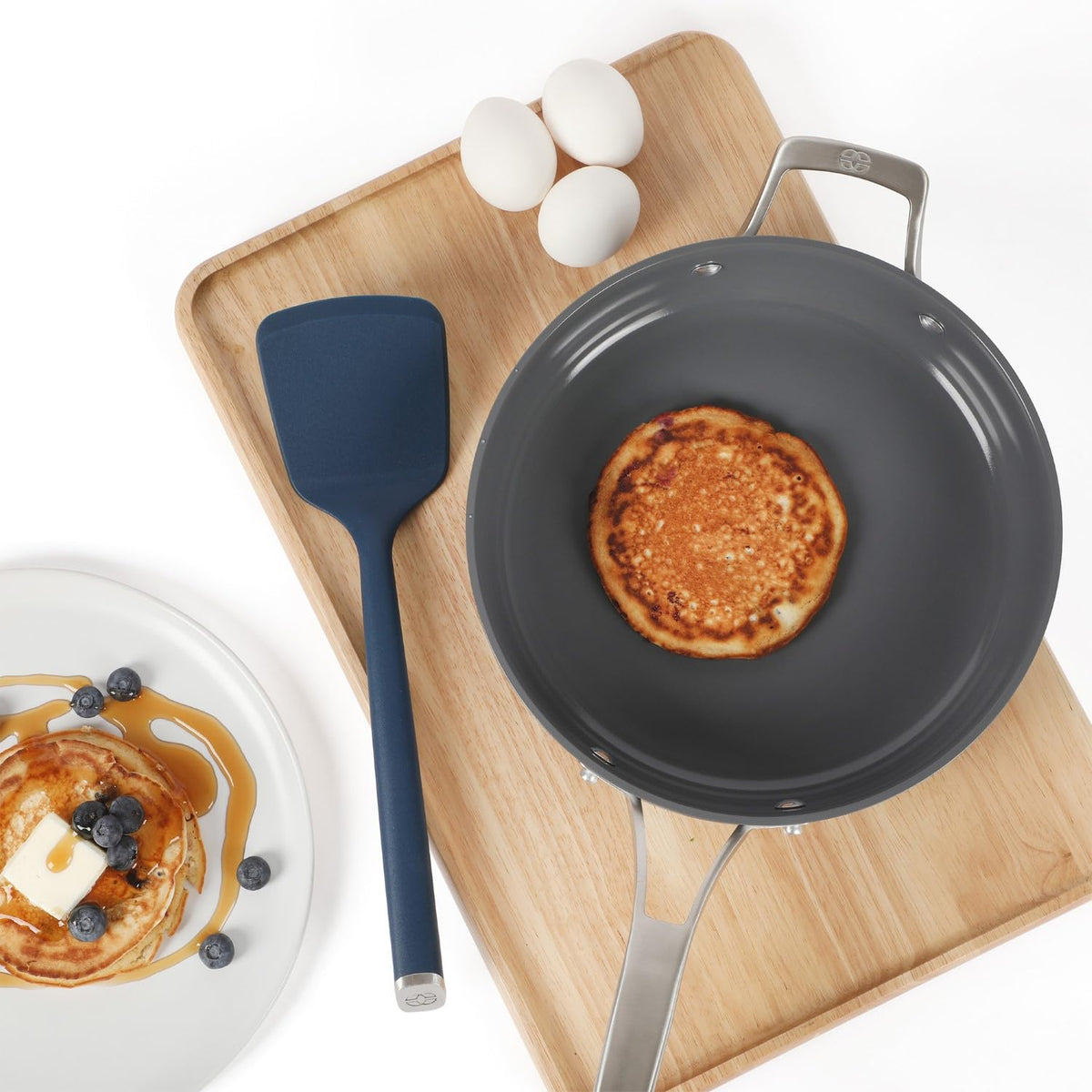 Calphalon Edge silicone turner safe for pan‑seared salmon and delicate proteins.