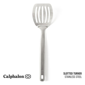 Calphalon Prime slotted spatula designed to lift foods while draining liquids.