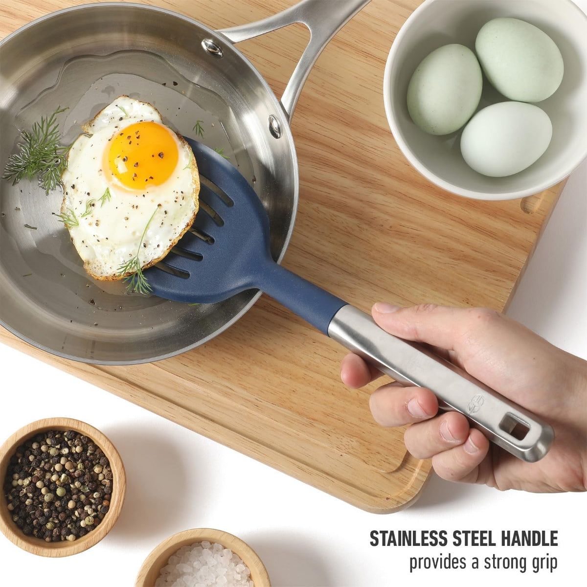 Calphalon Prime slotted turner handles thick chowder and sauces with ease.