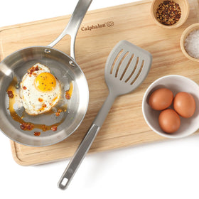 Calphalon Prime slotted turner ideal for flipping delicate foods on nonstick pans.