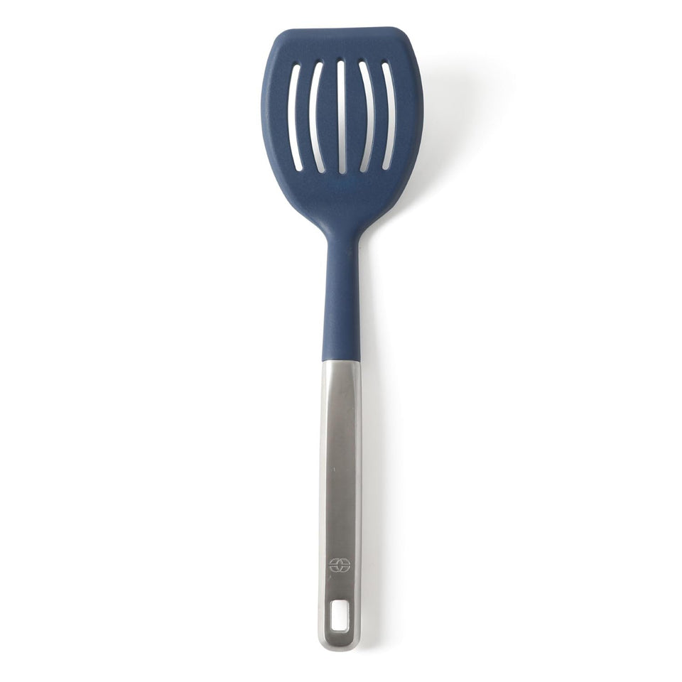 Calphalon Prime slotted turner with navy silicone head for gentle flipping of delicate foods.