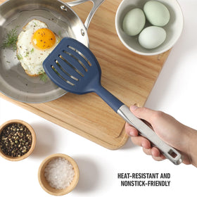 Calphalon Prime slotted turner preserves flavor with perforated design for draining liquids.