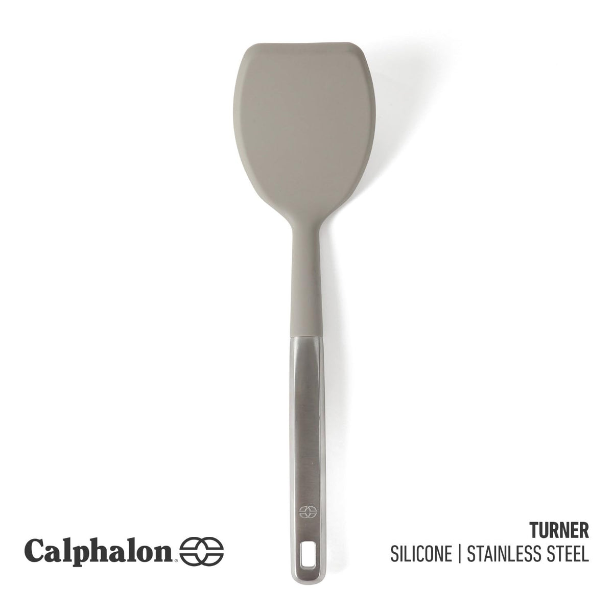 Calphalon Prime turner with stainless steel handle provides a secure grip.