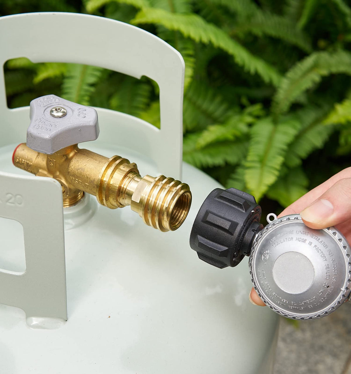 CALPOSE adapter in outdoor setup with 100 lb or RV tanks