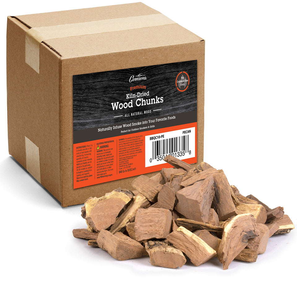 Camerons pecan wood chunks in smoker box front for quick, flavorful smoking.