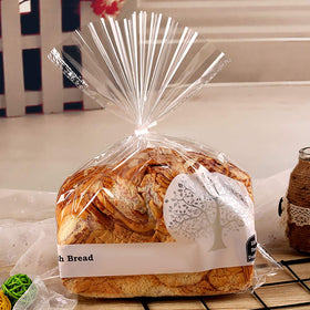 CandyHome 6-inch white twist ties securing bread and snack bags.