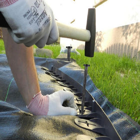 Canopix weed barrier stakes keep fabric in place against wind and rain