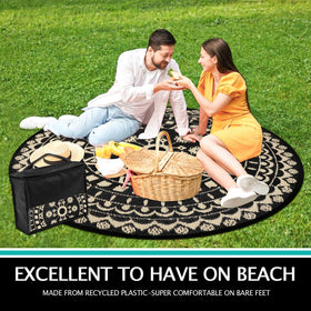 Capslpad lightweight rv camping rug folded in its carry bag