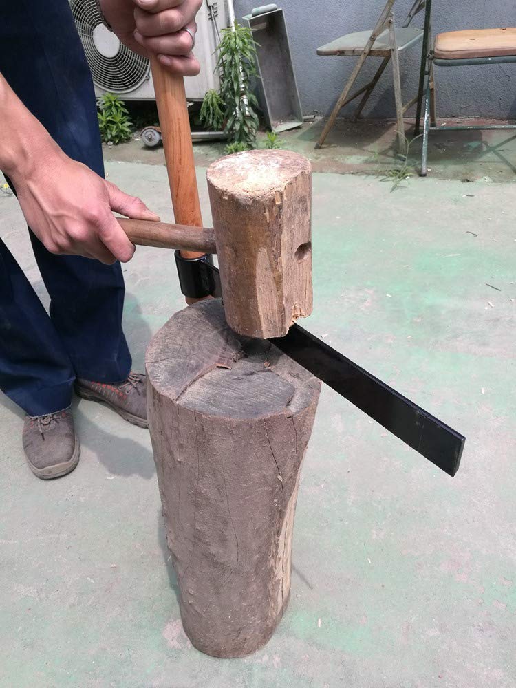 Carmyra Wood splitting action demonstrates grain-parallel separation.