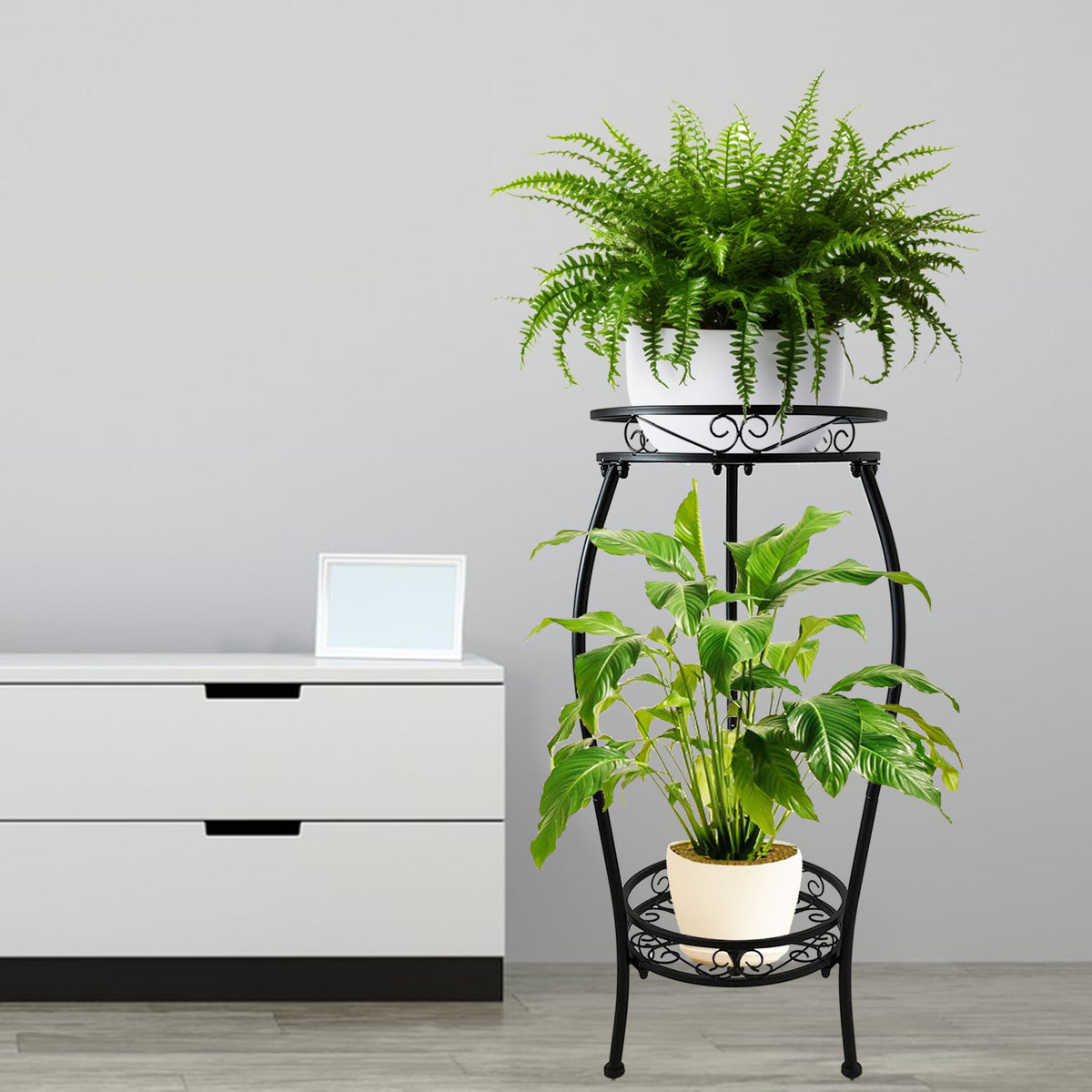 CASIMR 2-tier plant stand outdoors with rustproof finish on a balcony or patio.