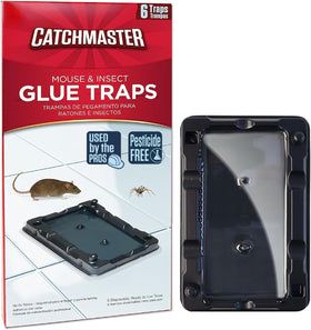 Catchmaster 6 glue trap set up along a wall catching mice and crawling insects.