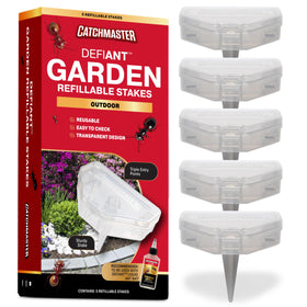 Catchmaster DEFIANT outdoor stake trap placed in soil for durable garden pest control