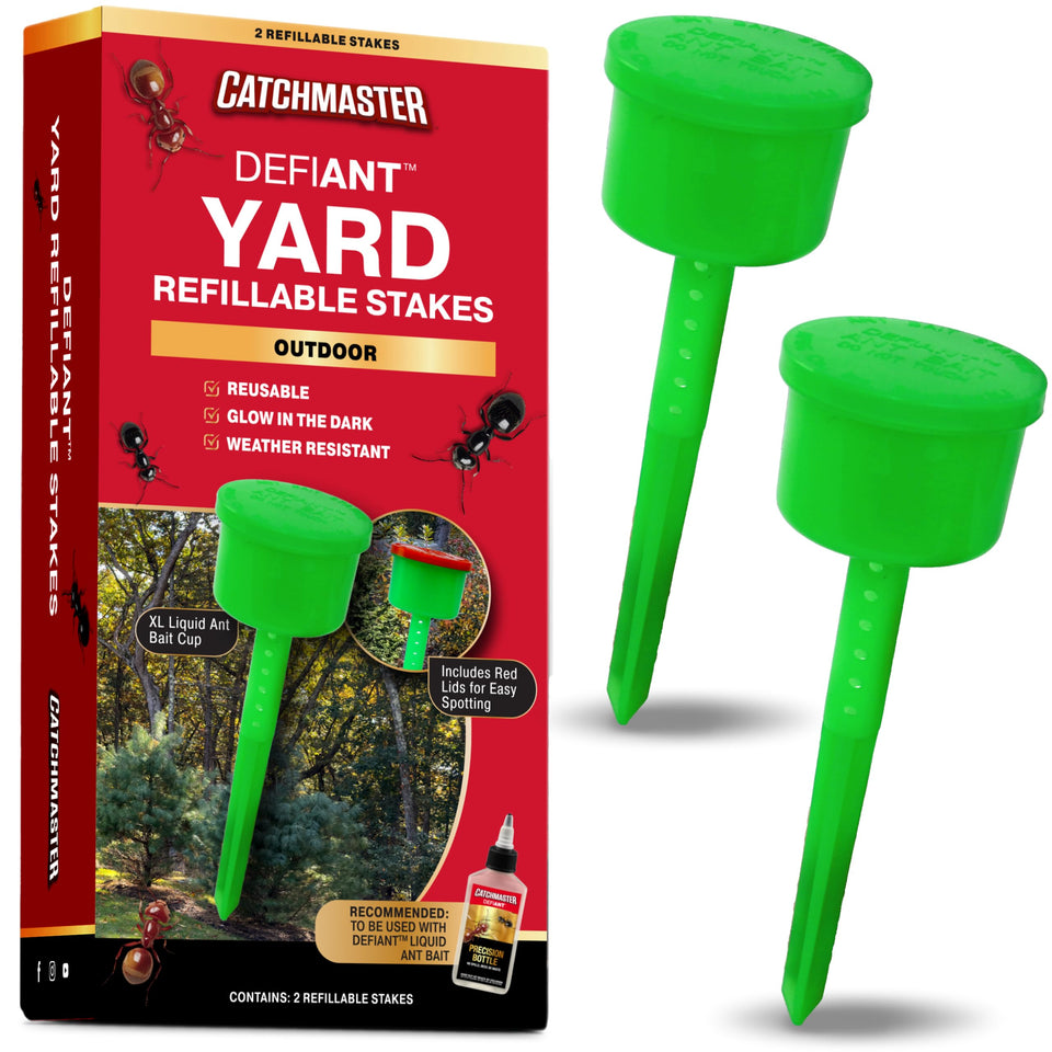Catchmaster Defiant XL outdoor ant traps in yard setup for wide-area coverage.
