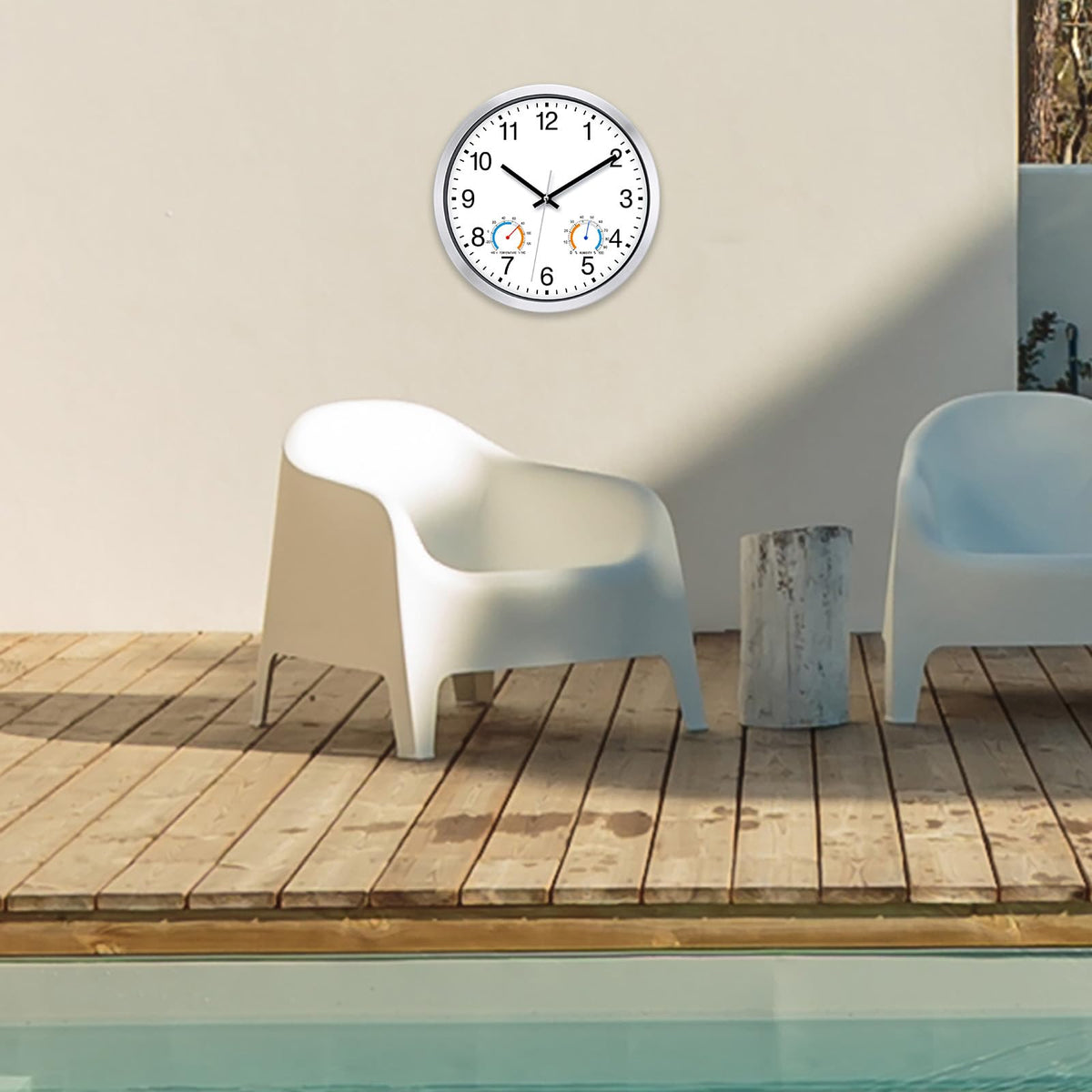 Caysie clock mounted in a patio setting for versatile outdoor use.