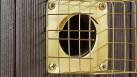 CEDAR ALPHA copper plate protection shields the entrance from the elements