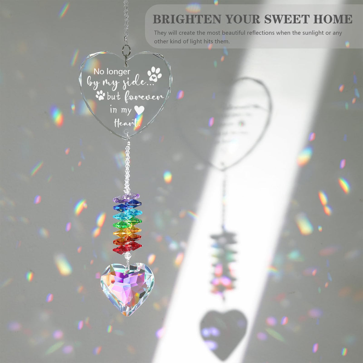 Ceegook dog memorial heart suncatcher closeup crystal showing prismatic colors.