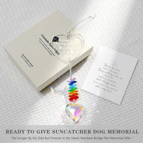 Ceegook dog memorial heart suncatcher in sunlight creating rainbow reflections.