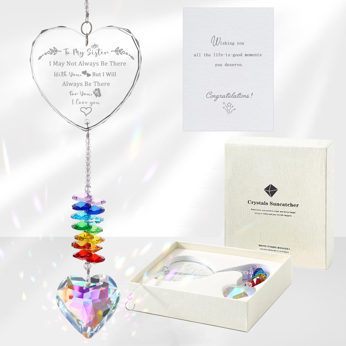 Ceegook sister crystal suncatcher with heart prisms creating colorful reflections.