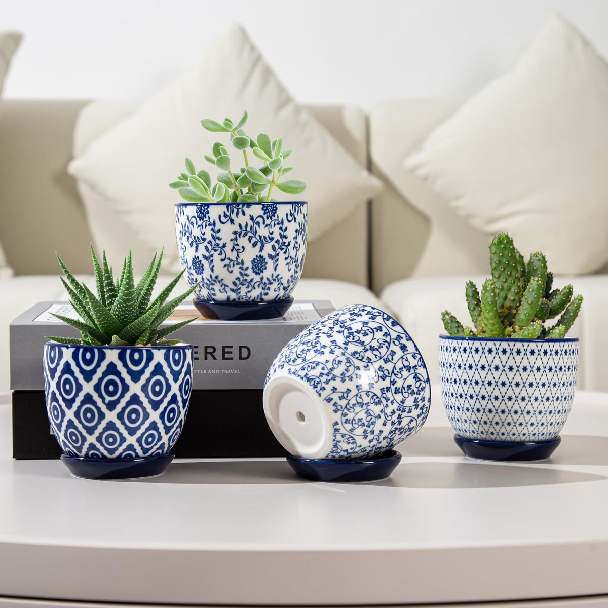 Cerkik vintage blue ceramic pot on windowsill for herbs.