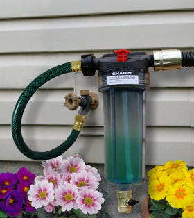 Chapin HydroFeed installed beside spigot for convenient in-line mixing
