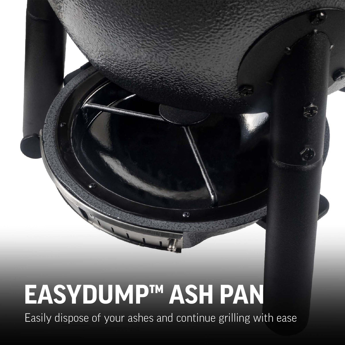 EasyDump ash pan on the AKORN Jr simplifies cleanup after grilling.