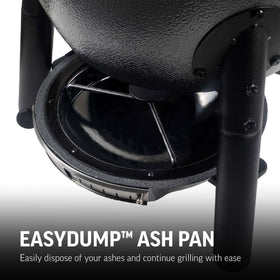 EasyDump ash pan on the AKORN Jr simplifies cleanup after grilling.