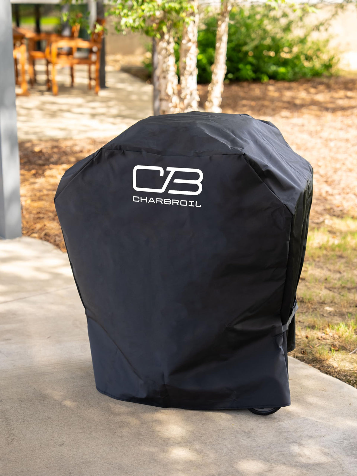 Charbroil Bistro Pro grill cover shields the grill from weather with secure side straps.