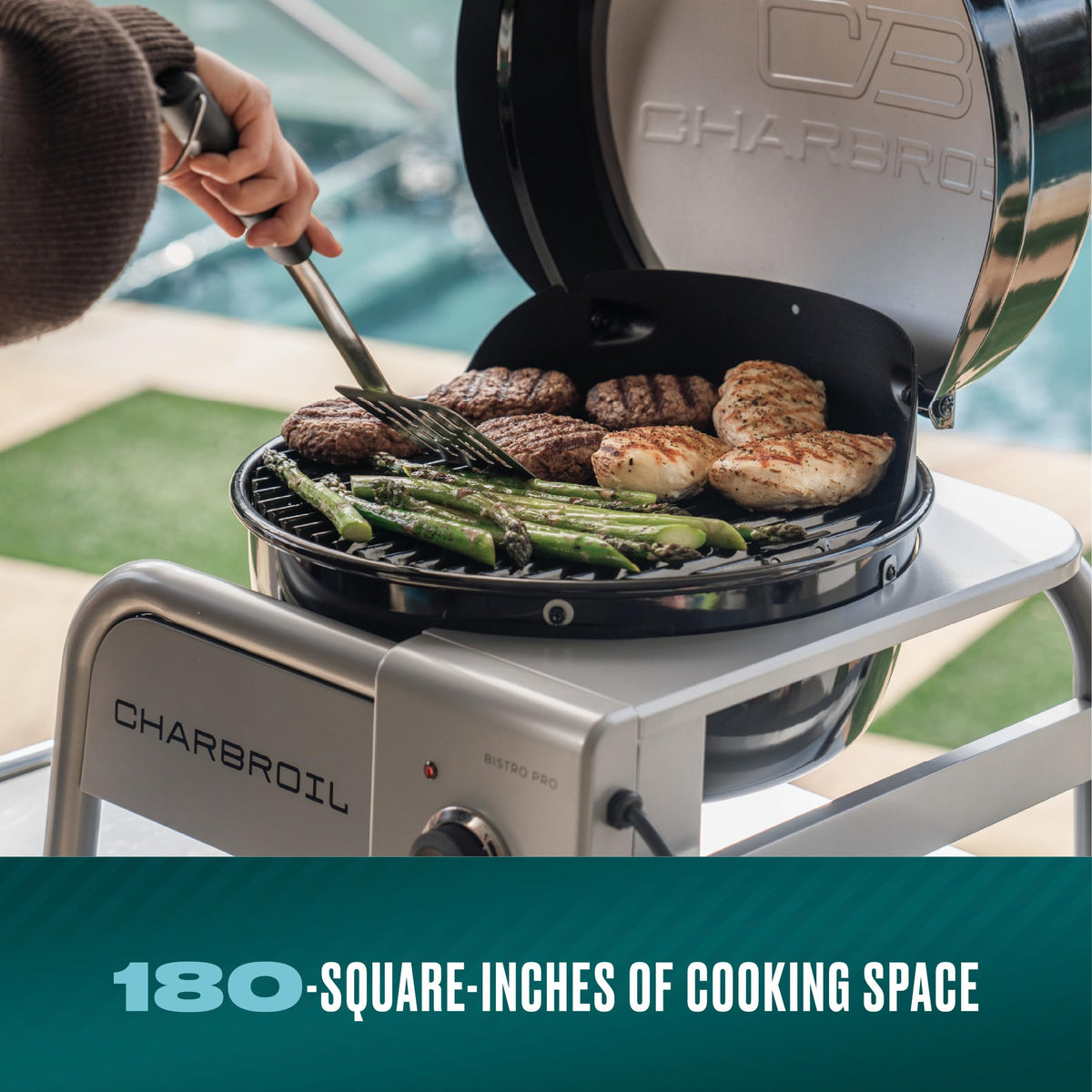 Charbroil Bistro Pro, open lid, shows ample 180 sq in cooking area.