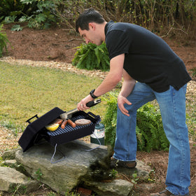 Charbroil grill side view with folded legs demonstrates compact storage