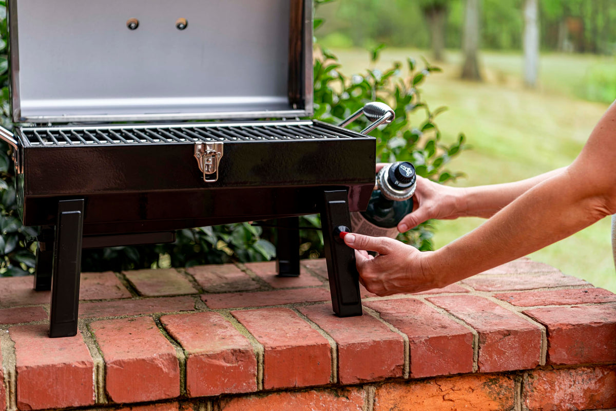 Charbroil grill shows 200 square inches of cooking space for burgers and vegetables.