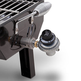 Charbroil portable grill with heat-resistant handles, ideal for safe transport.