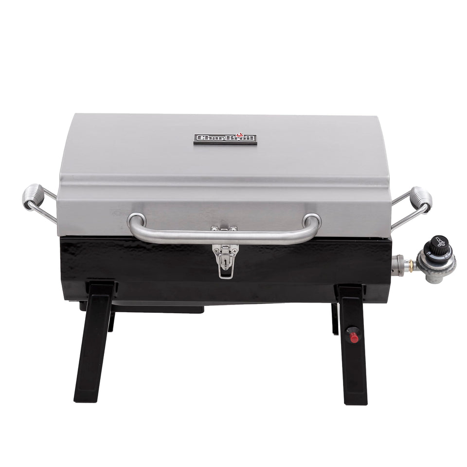 Charbroil portable grill ignition button for quick startup on the go.