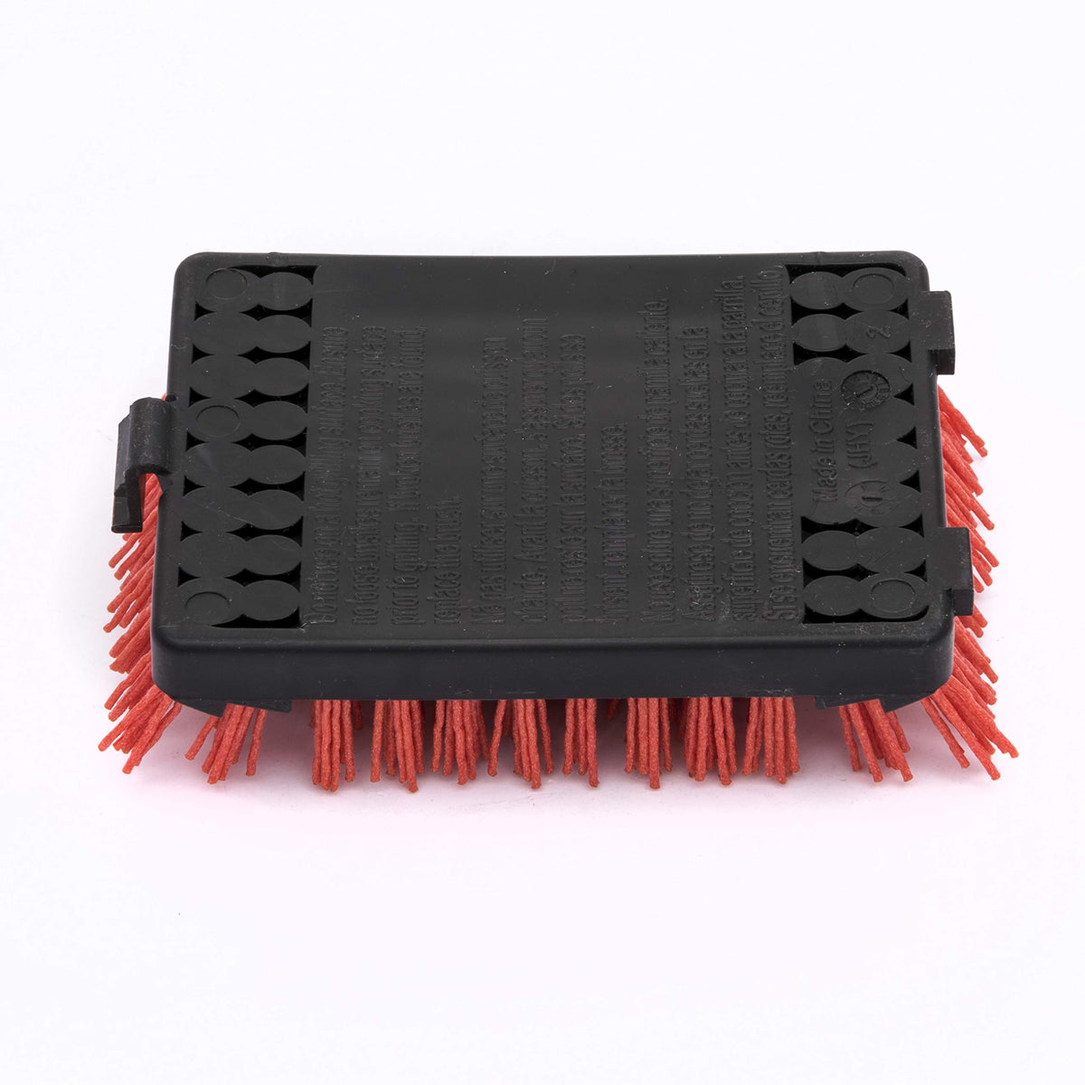 Grit infused bristles remove grime without metal debris