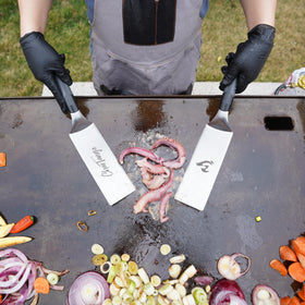 CharTango ergonomic TPR handles provide secure grip during cooking