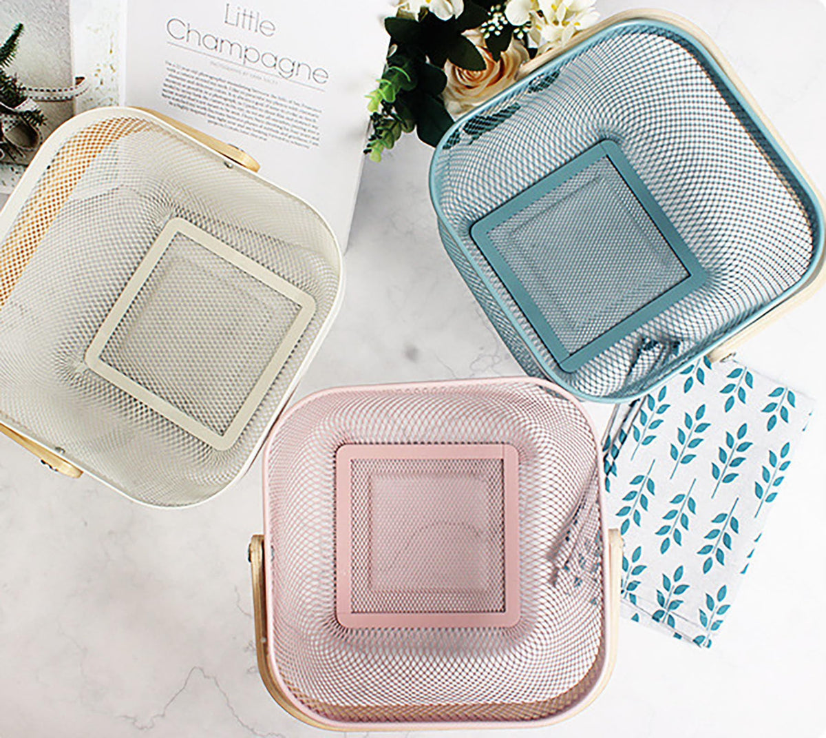 Cheardia blue rectangle mesh basket adds stylish storage on kitchen shelves.