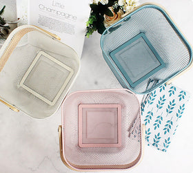 Cheardia blue rectangle mesh basket adds stylish storage on kitchen shelves.