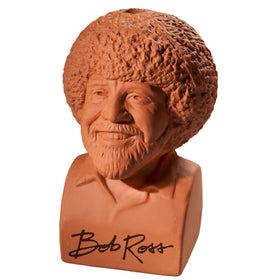 Chia Pet Bob Ross decorative planter shown with drip tray for tidy display.