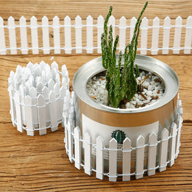 Chinco fence in a pot garden decoration enhances succulent display with charming boundary