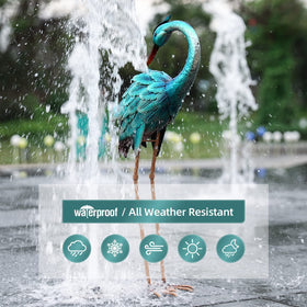 Chisheen crane statue by pond edge creates a tranquil focal point.
