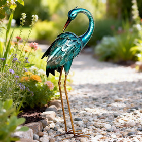 Chisheen metal yard art crane serves as a focal point in gardens.