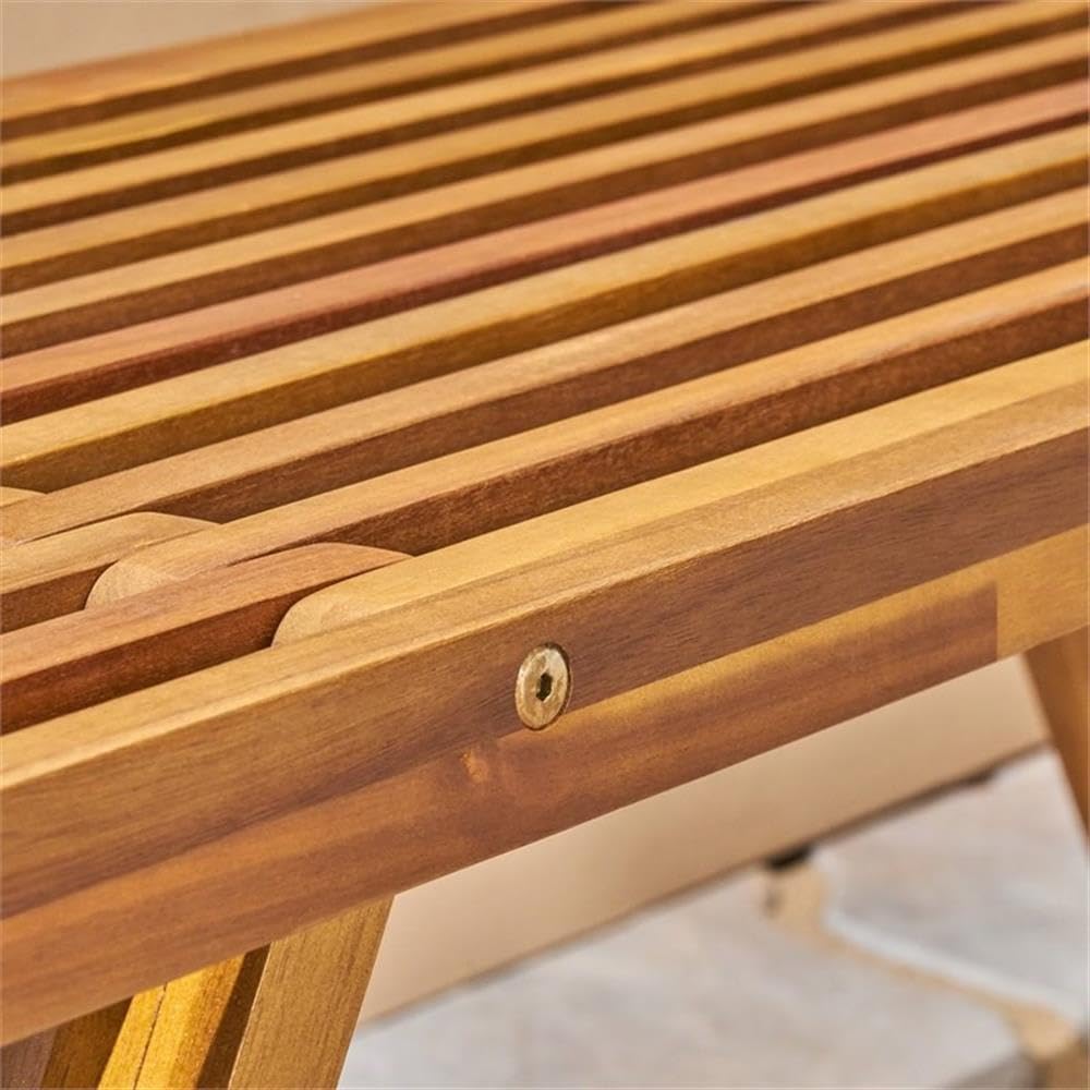 Teak toned acacia wood suits coastal or modern outdoor decor.