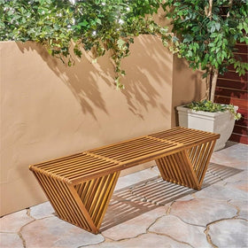 Esme bench side view highlights teak finish and sturdy acacia construction.