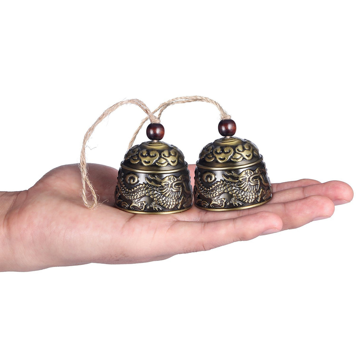 Chuangdi dragon fish cloud motif bell complements doorway with auspicious symbolism.