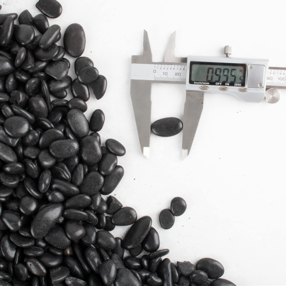 CJGQ Black Pebbles ideal for aquarium decor and color contrast.