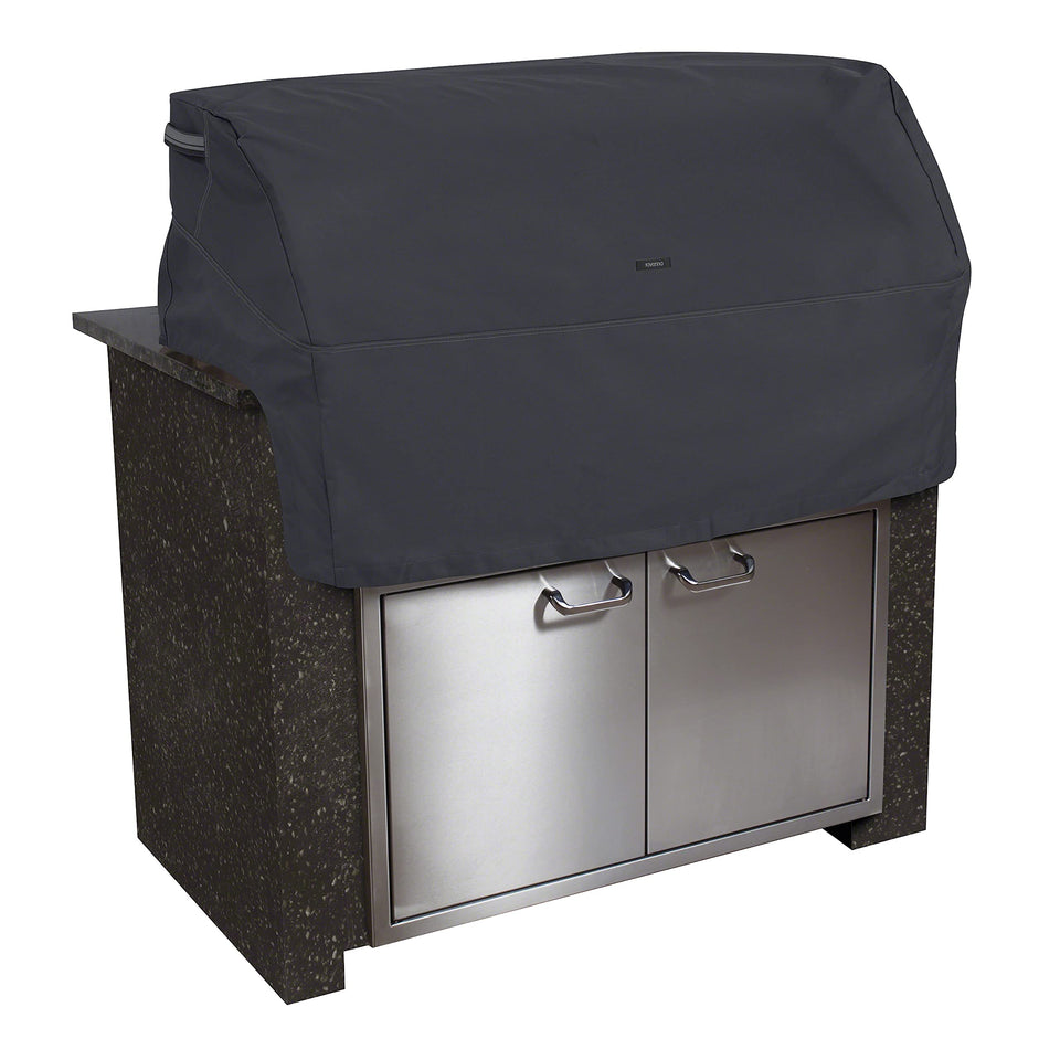 Classic Accessories Ravenna built-in grill top cover protects a 37-inch grill from rain and sun.