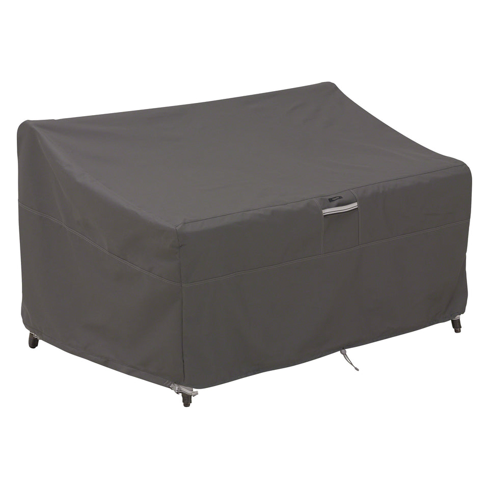 Classic Accessories Ravenna loveseat cover protecting deep-seated furniture from rain and sun.