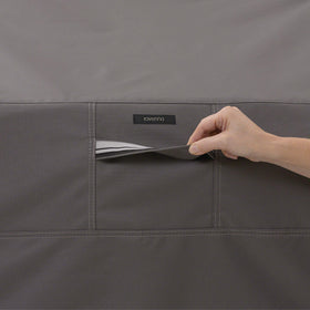 Zippered top pocket keeps grill tools within reach.